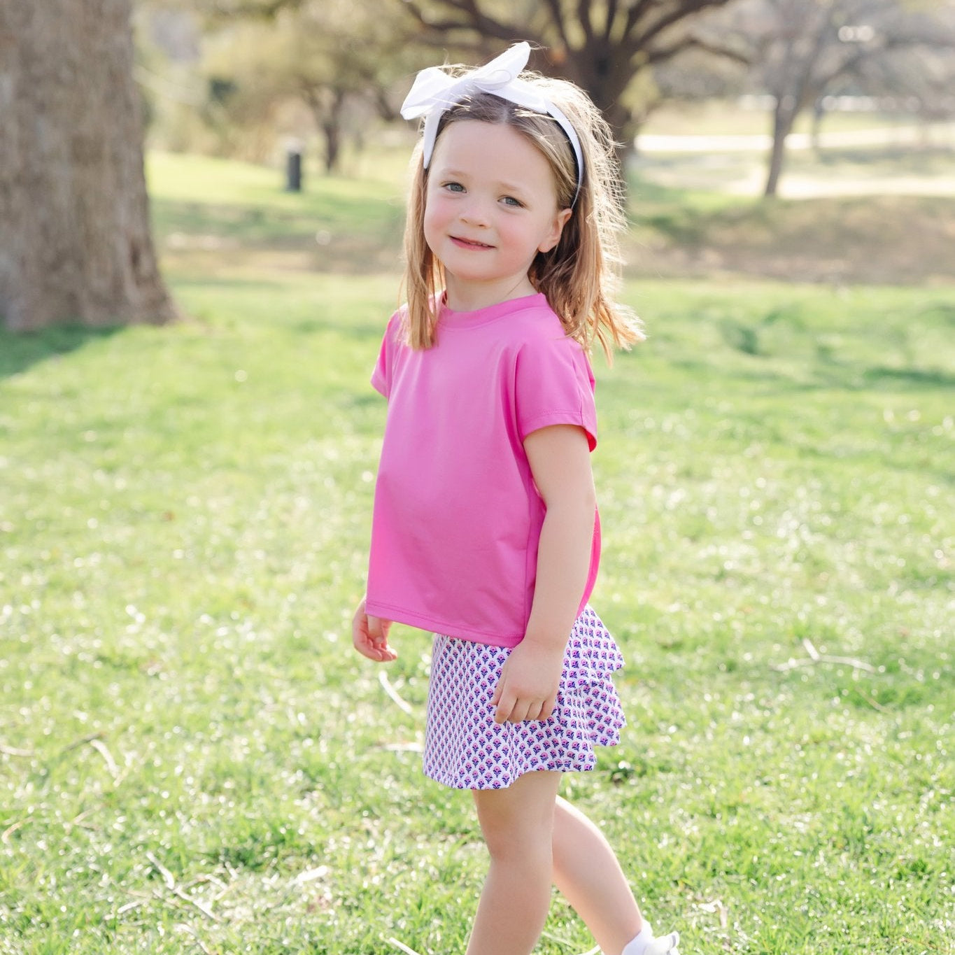 Sloane Girls' Short Sleeve Performance Top by LH Sport - Hot Pink