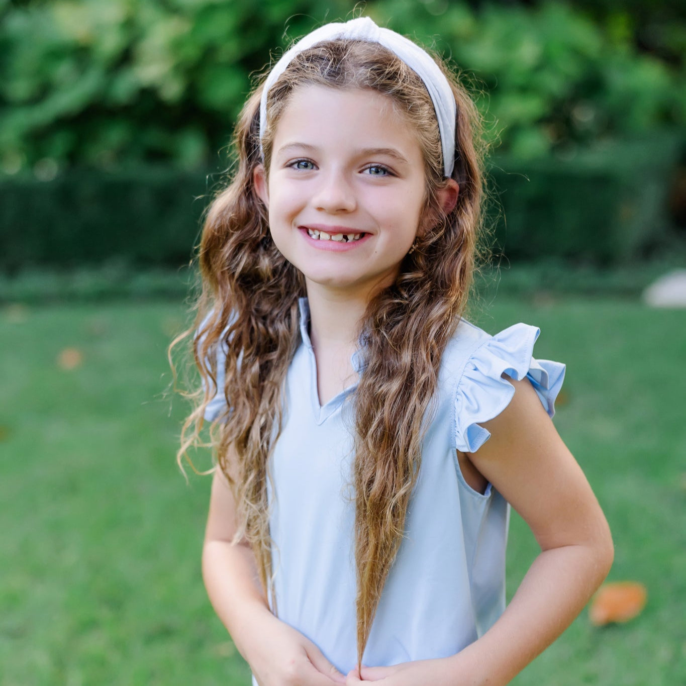 Ellie Girls' Sleeveless Performance Top by LH Sport - Light Blue