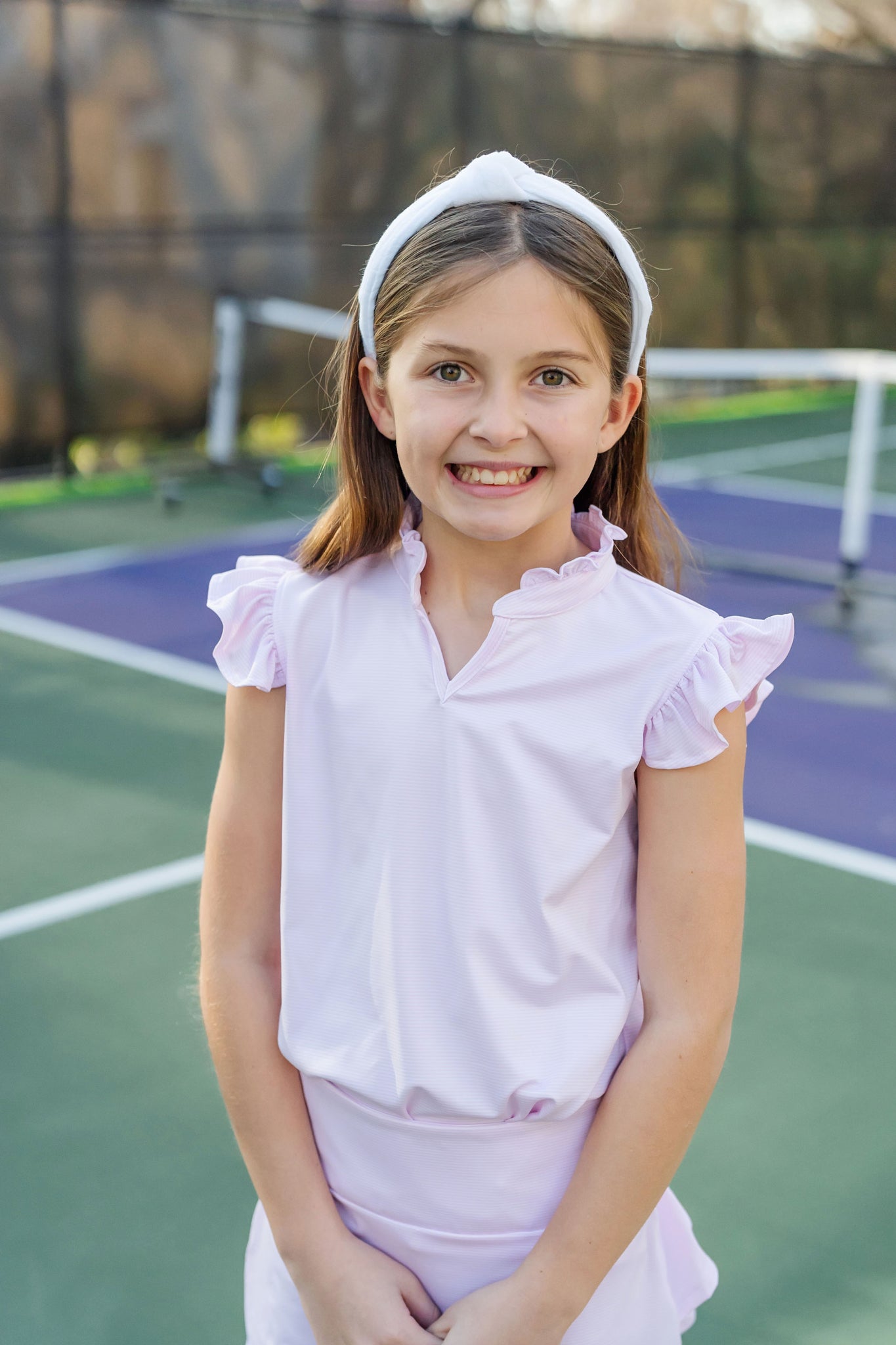 Ellie Girls' Sleeveless Performance Top by LH Sport - Pink Stripes