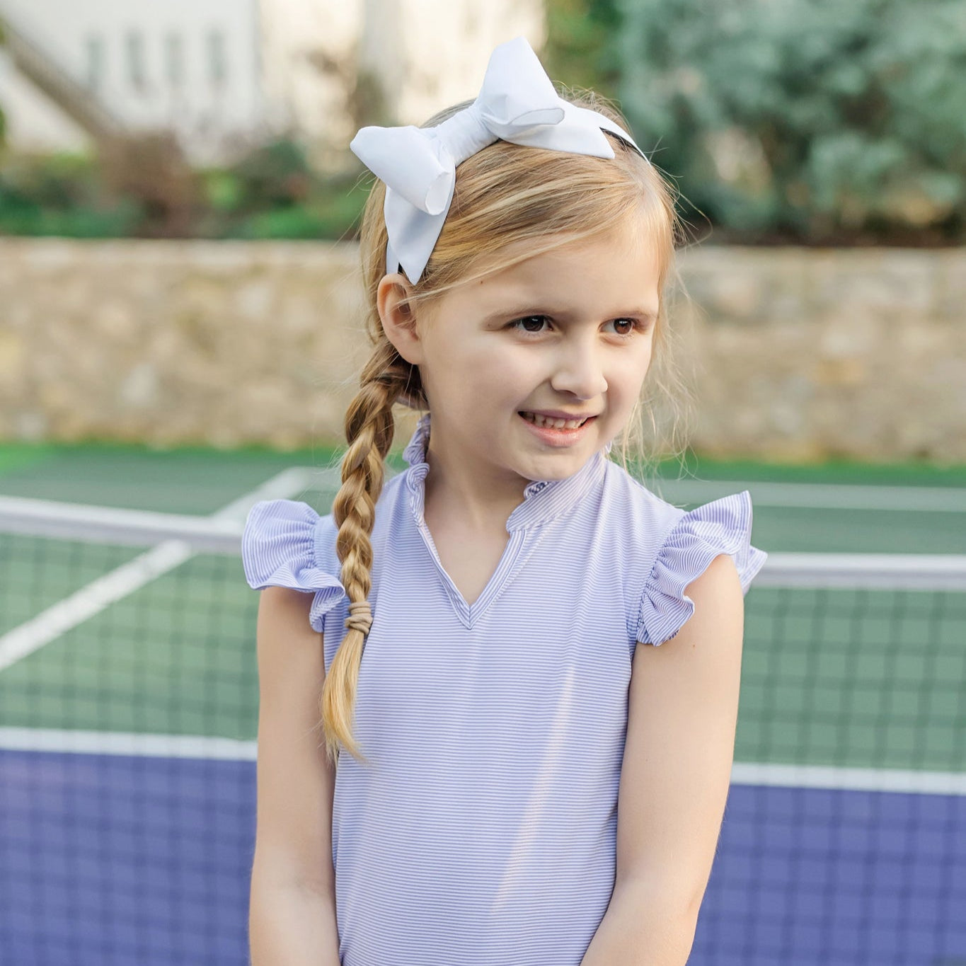 Ellie Girls' Sleeveless Performance Top by LH Sport - Purple Stripes