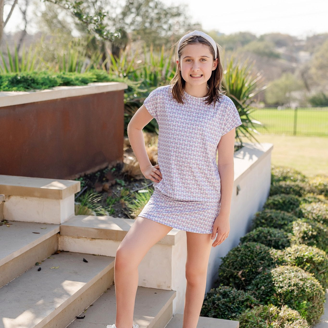 Sloane Girls' Short Sleeve Performance Top by LH Sport - Peace Love Butterflies Pink Multi outfit perfect for everyday wear