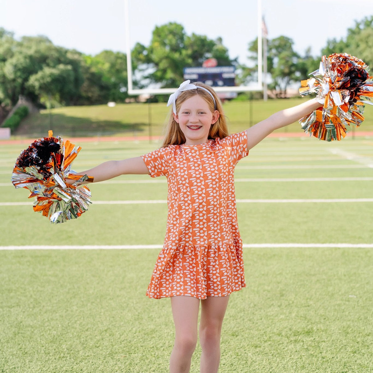 Lottie Girls' Dress - Pep Rally Orange outfit perfect for everyday wear