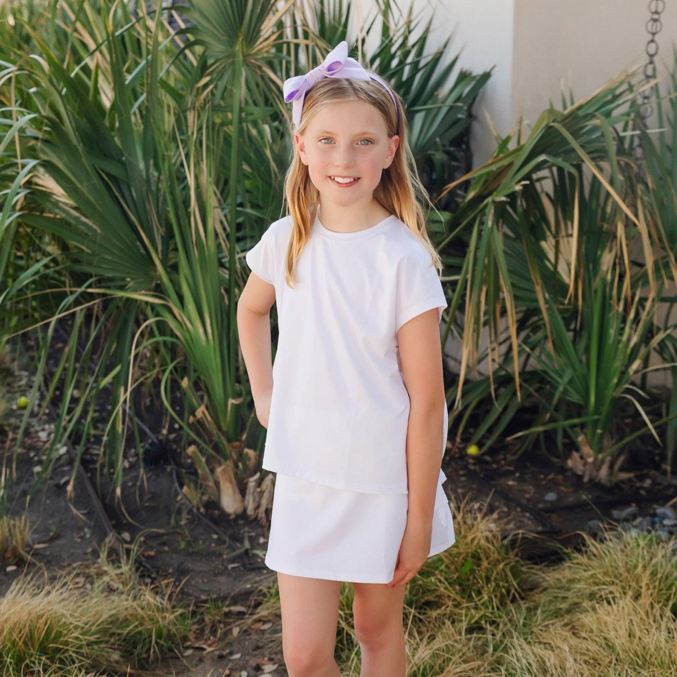Sloane Girls' Short Sleeve Performance Top by LH Sport - White