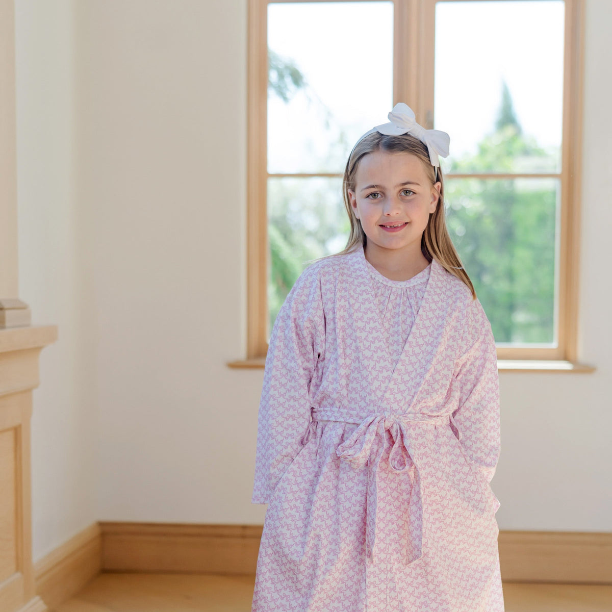Gwen Girls' Spa Wrap Pretty Pink Bows outfit perfect for everyday wear